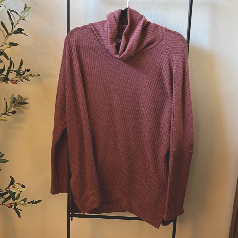 A thin waffle mock neck sweater